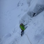 Steve on P1, approaching the belay, Direct Route