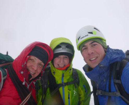 On the summit of Beinn a'Chaorainn on a winter mountaineering course