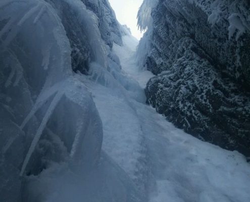 Good winter climbing in an icy No. 2 Gully, Ben Nevis