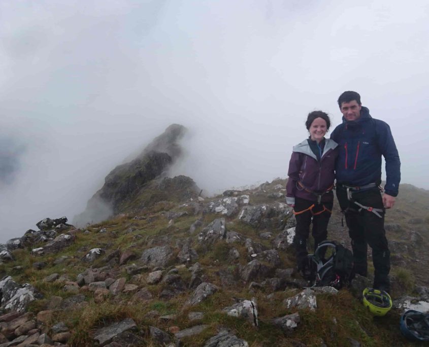 Happy clients being guided on the Aonach Eagach